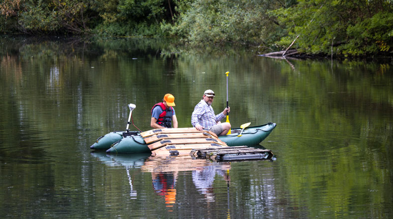 City of Gresham Natural Resources staff replace the turtle sunning platforms on a local waterway.