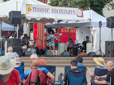 Crowds relax on the Gresham Arts Plaza while listening to Michelle Lambert perform during Gresham's free summer concert series Music Mondays.