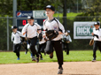 Photo of kids playing a baseball game at Main City Park