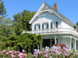 Photo of irises in bloom at the historic Zimmerman House Heritage Farm in Gresham