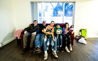 Family in their new home in Gresham