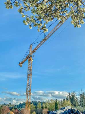 A large crane signals development activity at the new East County Library on the corner of Division Street and Eastman Parkway in Civic Neighborhood.