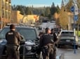 Three officers stopping a suspect during a retail theft mission.