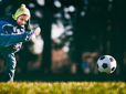 Child playing soccer at Kirk Park