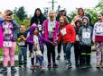 A line of children eagerly await the start of the Little Lilac Run to start.