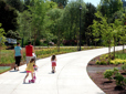 People on paved path in Main City Park